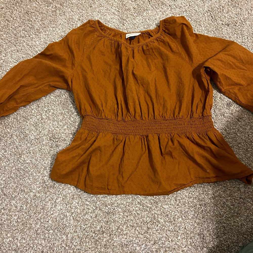 Cute fall blouse, only worn once! size large but fits small and medium too.